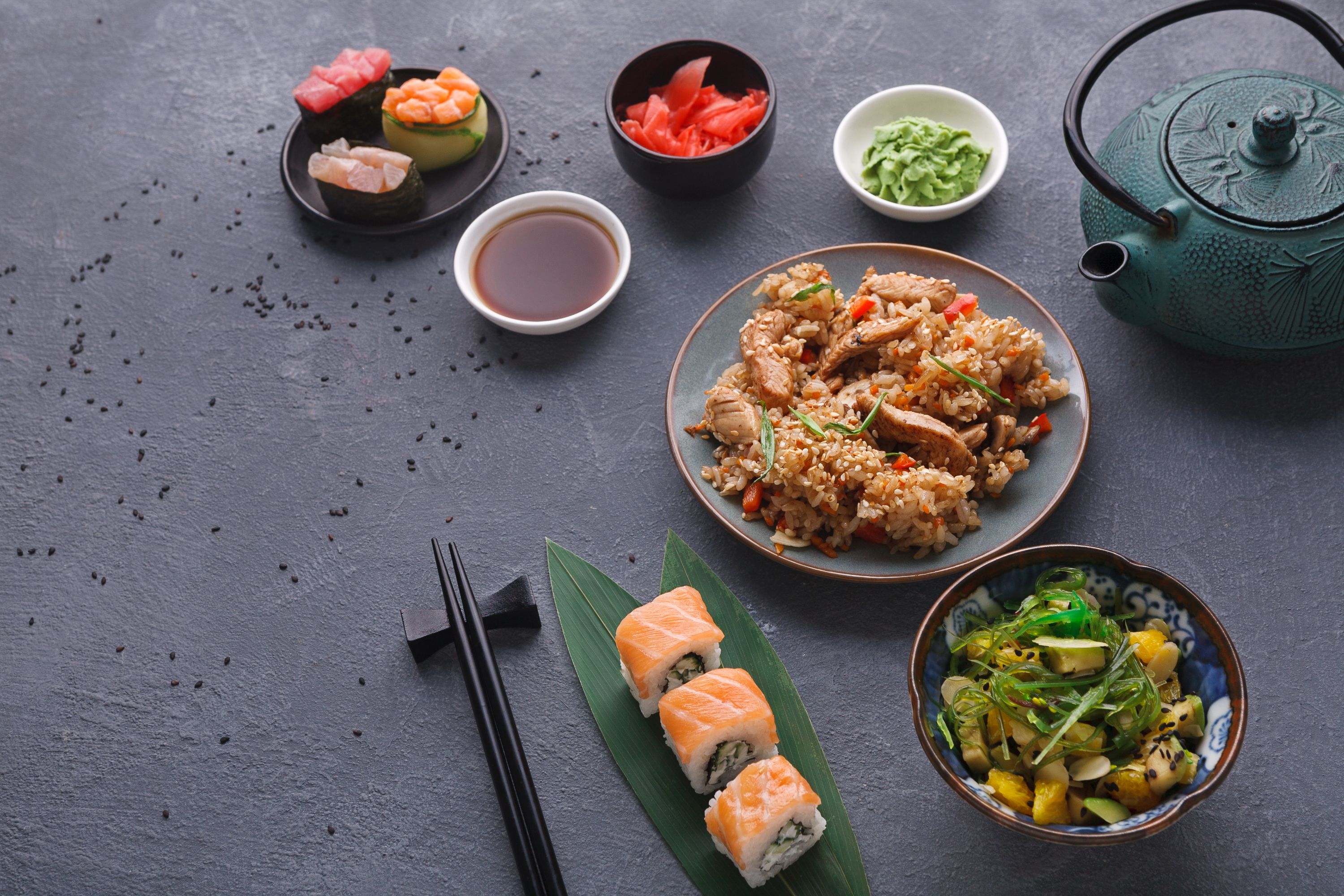 Japan Asian Cuisine Teriyaki Beef Rice Salad Gunkans Rolls On Bamboo Leaf Teapot Chopsticks Ginger Soy Sauce Wasabi