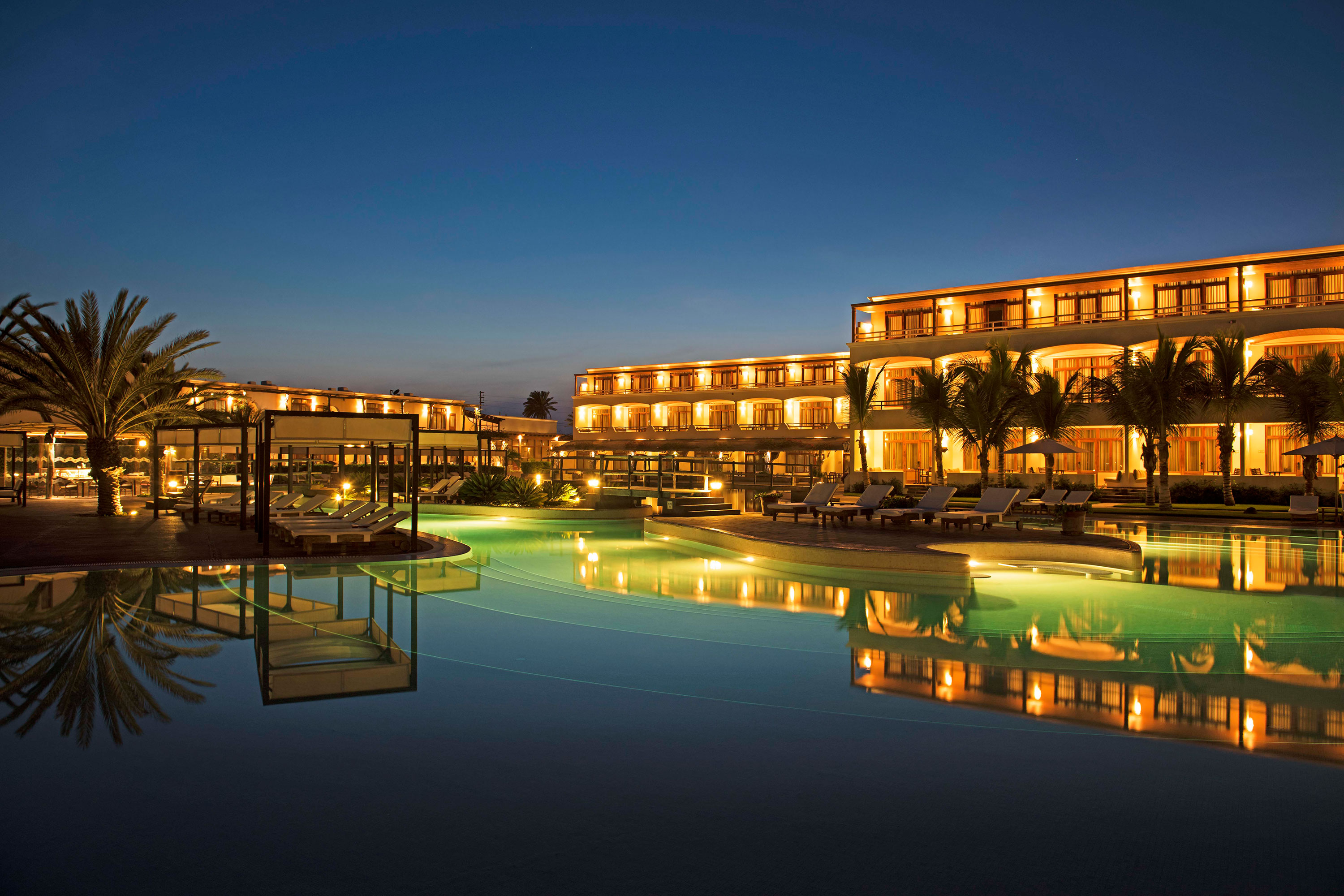 Pool And Hotel By Night